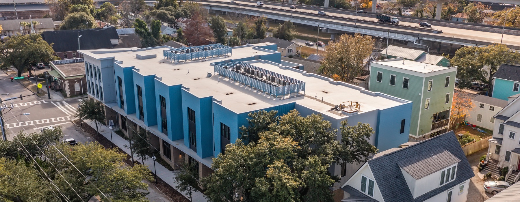 Exterior view of The Rumney, a boutique apartment community on Romney Street in Downtown Charleston South Carolina.